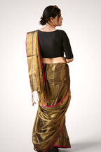 Pallu detail of gold tissue cotton saree with metallic sheen