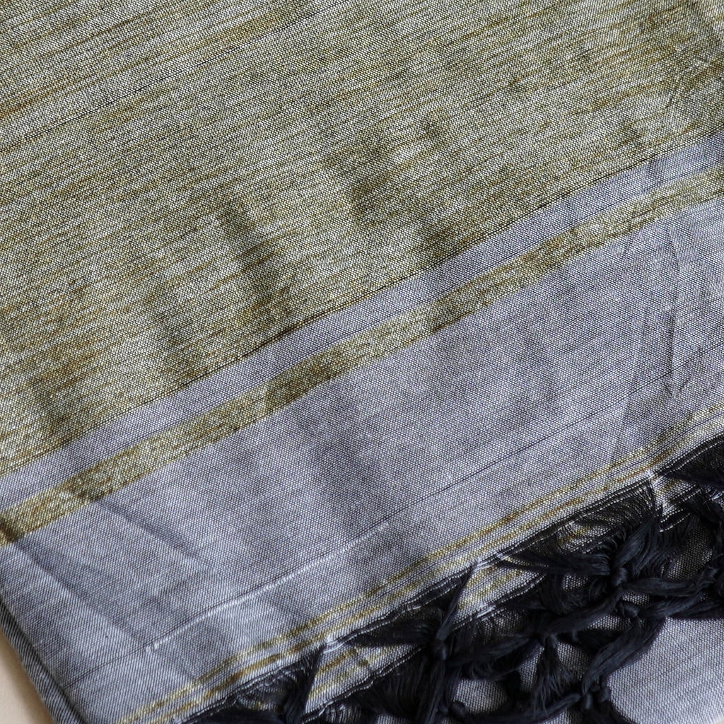 fabric texture of ash grey khadi cotton handloom saree from West Bengal