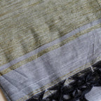 fabric texture of ash grey khadi cotton handloom saree from West Bengal