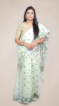 model draped in a mint green Baluchari Taant cotton saree with jacquard-woven motifs from West Bengal.