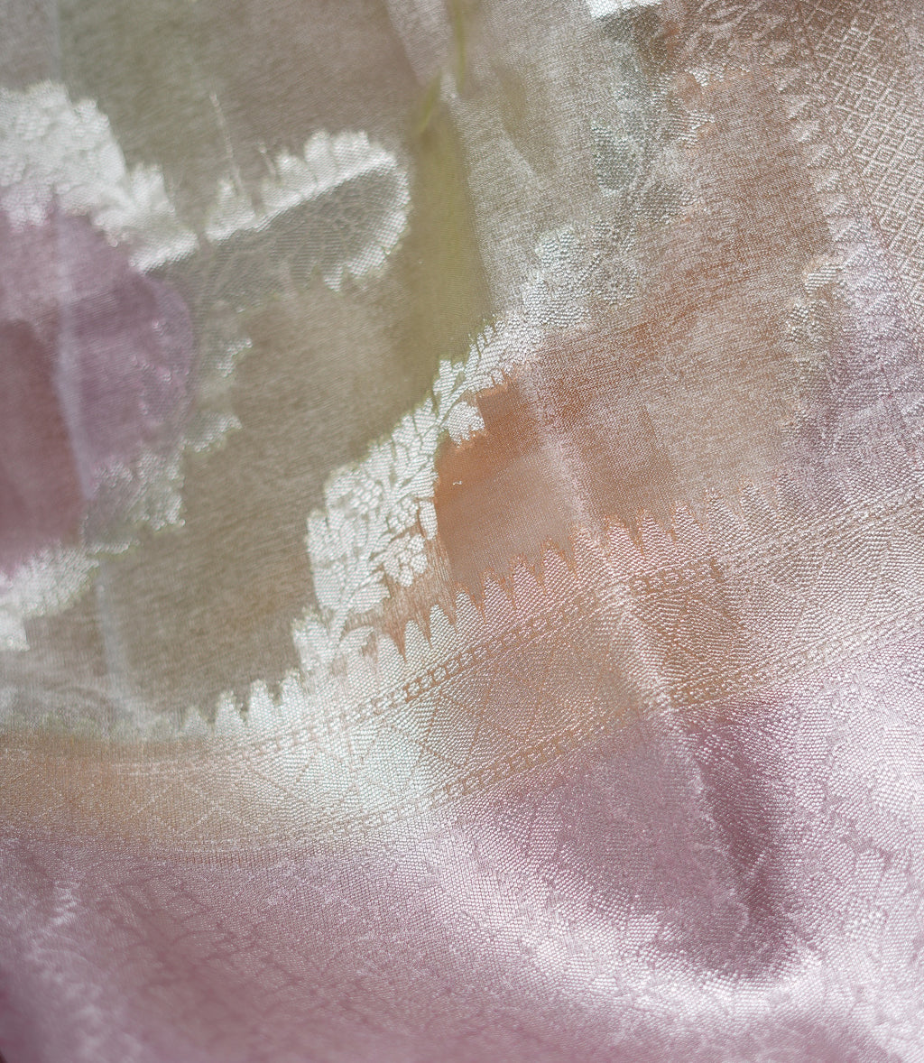 fabric texture of pastel peach tissue rangkat banarasi handloom saree.