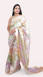 right view of model draped in pastel peach tissue rangkat banarasi handloom saree
