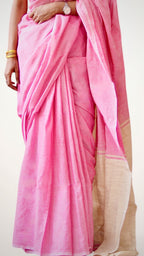 Pleats of handwoven pink khadi cotton saree